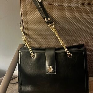 Sophisticated Black Leather Shoulder Bag with Gold Chain